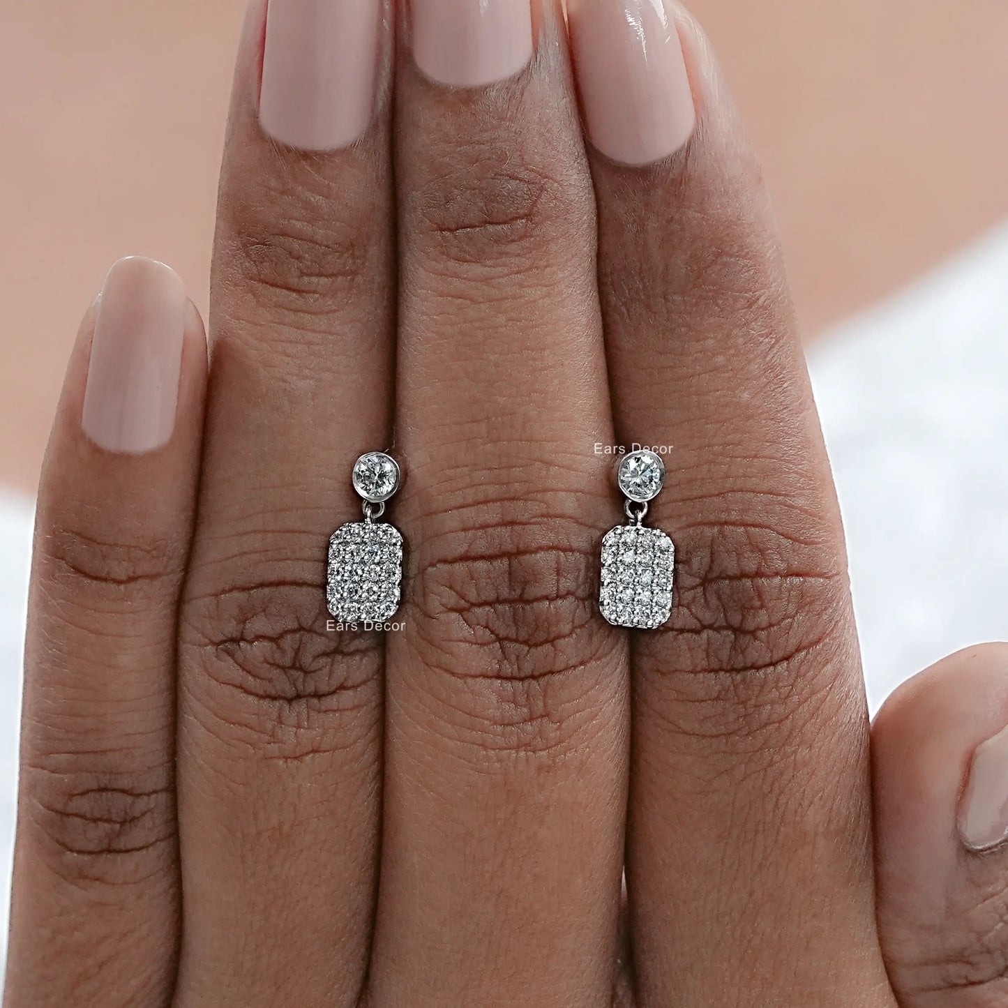 square cluster natural diamond earrings on fingers for reference
