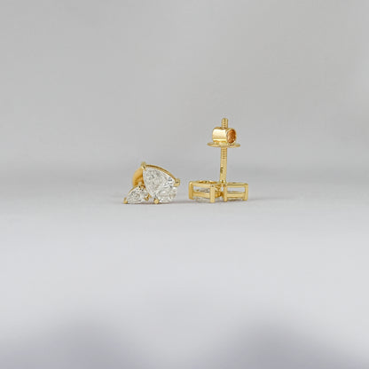 Pear diamond cluster stud earrings gold prong setting front and back view showing yellow gold screw back post clasp detail soft background