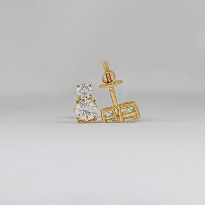 Round brilliant cut double diamond stud earrings 14k yellow gold front and back view grey background close-up product shot screw post detail