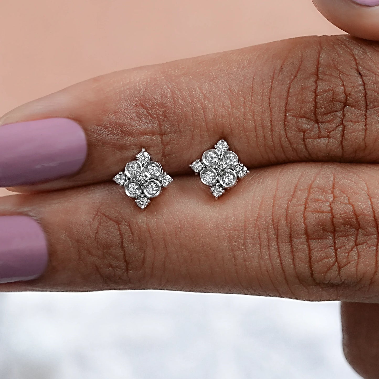 beautiful round diamond bezel set cluster earrings for daily wear