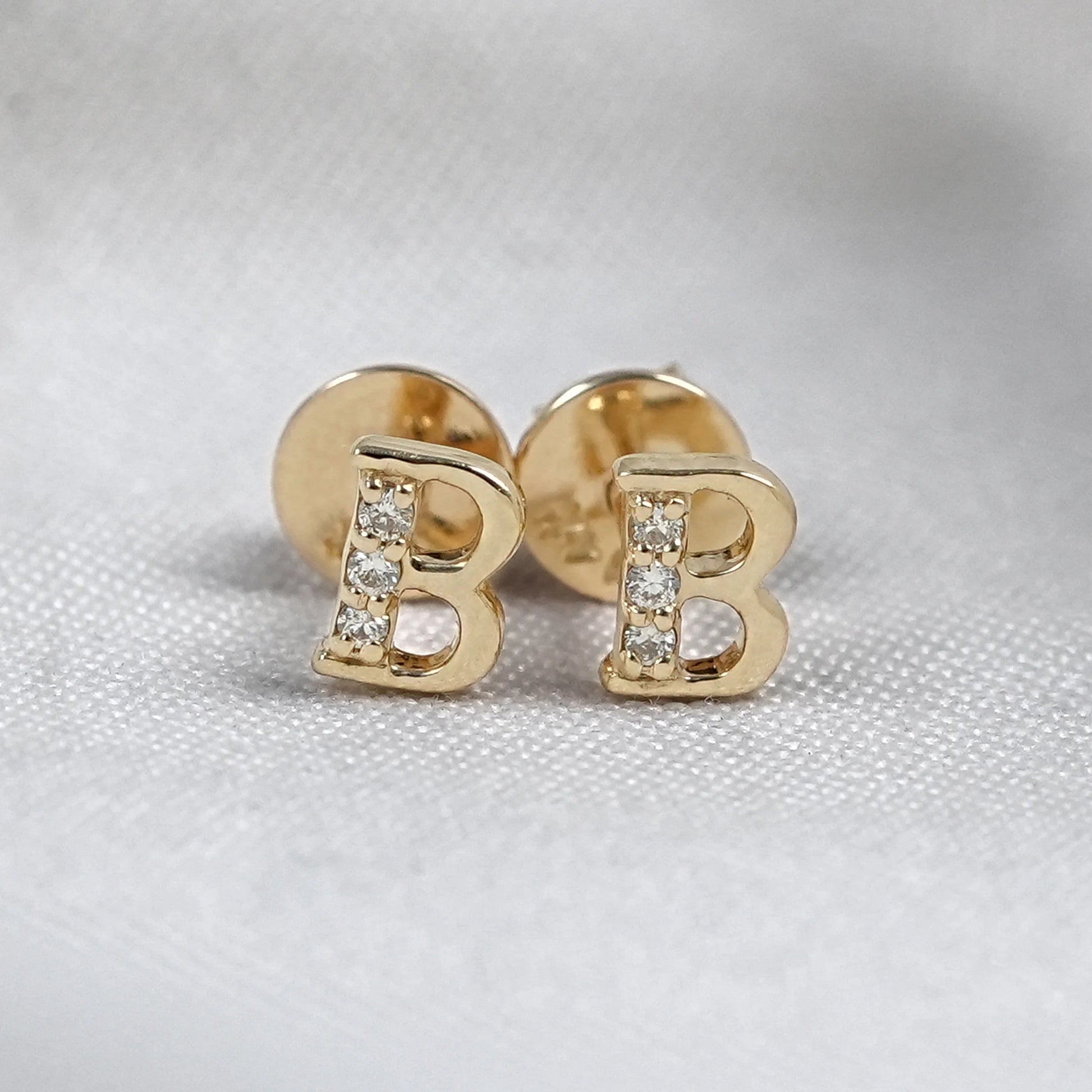 10k gold initial b letter stud earrings with round natural diamonds on fabric