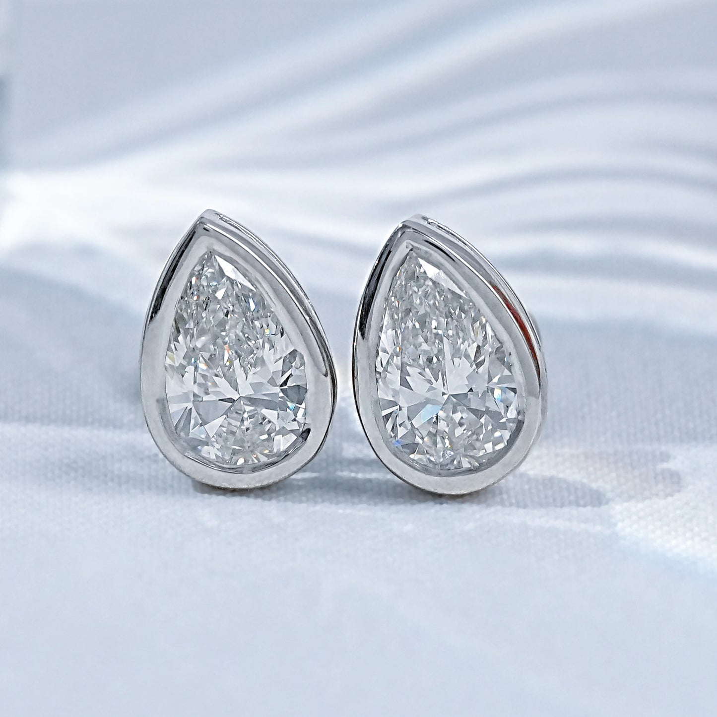 Brilliant Pear Cut Bezel Set CVD Diamond Stud Earrings