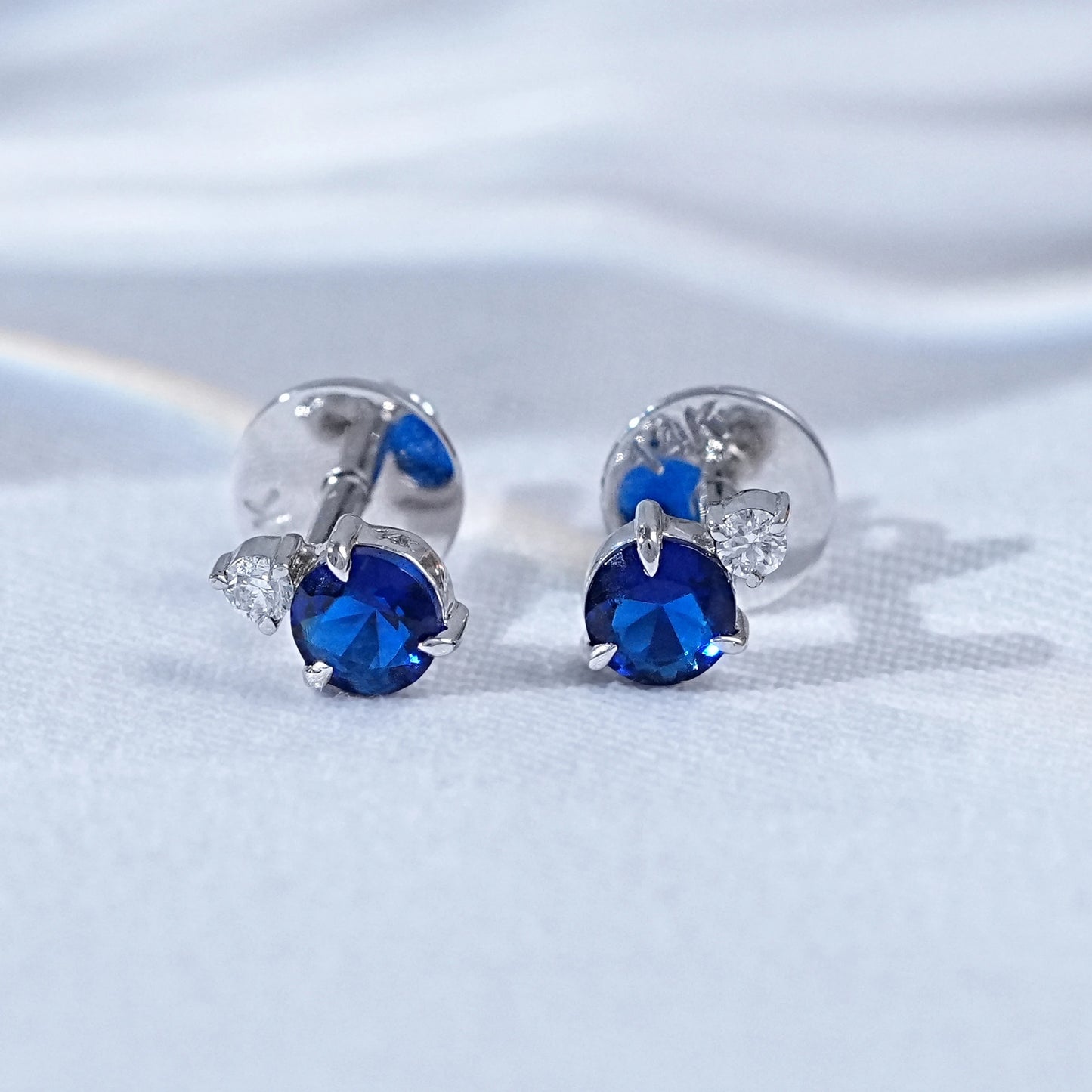 Round Cut Tanzanite And Diamond Two Stone Stud Earrings