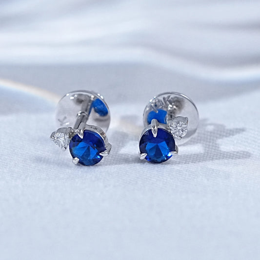 Round Cut Tanzanite And Diamond Two Stone Stud Earrings