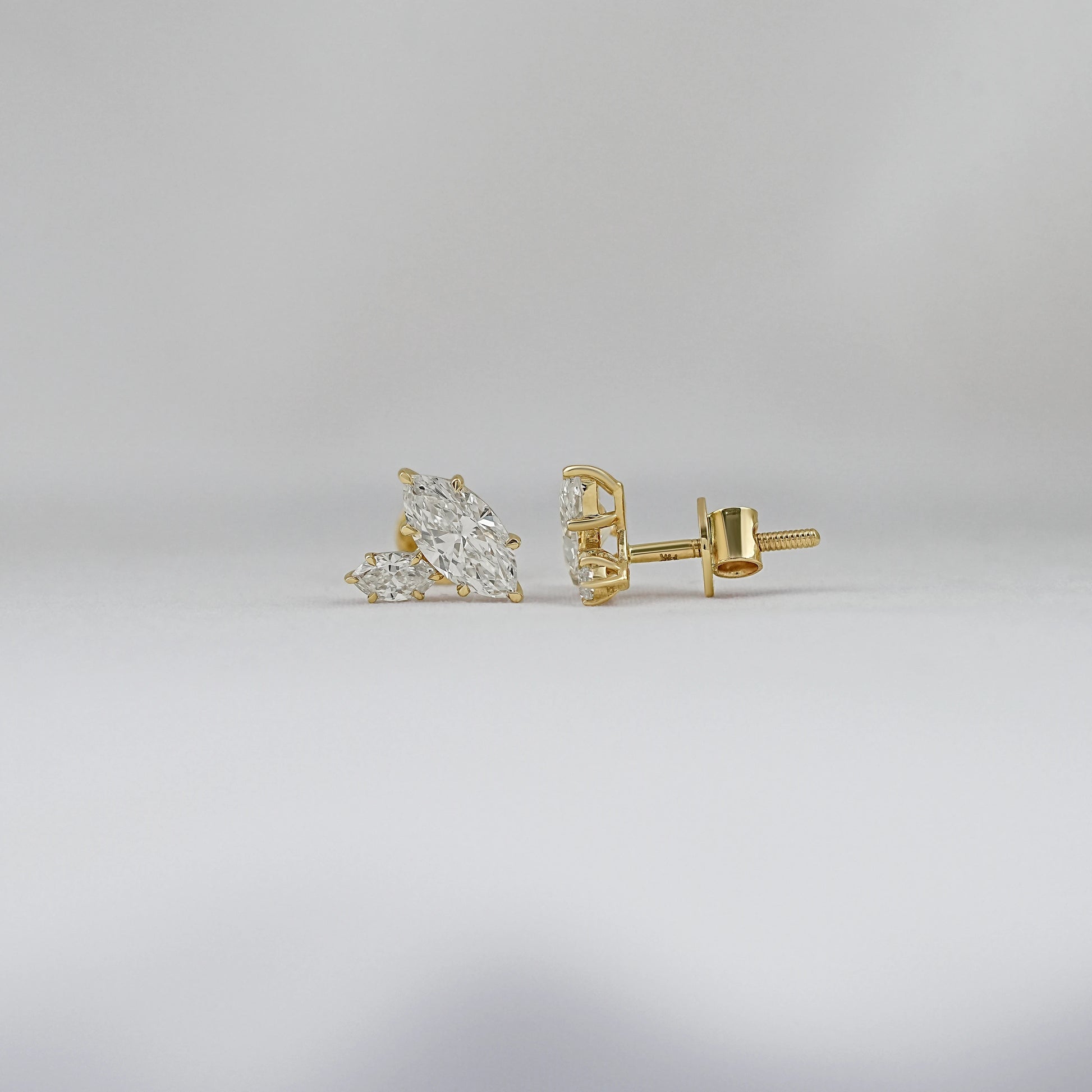 Cluster marquise diamond earrings for women in yellow gold side view screw back stud design