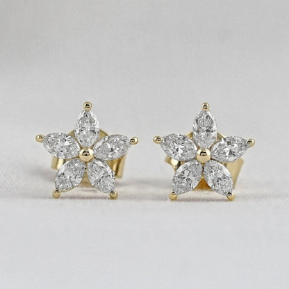 14k yellow gold marquise diamond flower stud earrings for women featuring five brilliant marquise petals around a central gold bead.
