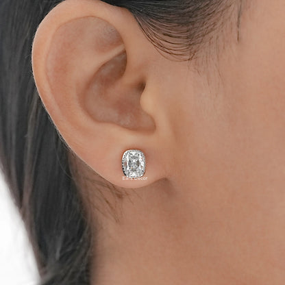 Square cushion cut diamond stud earrings white gold minimalist bezel design worn model ear dark hair warm skin side profile
