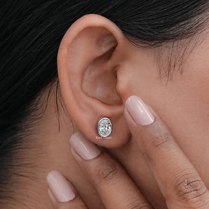 Earth Mined Oval Cut Diamond Bezel Set Stud Earrings