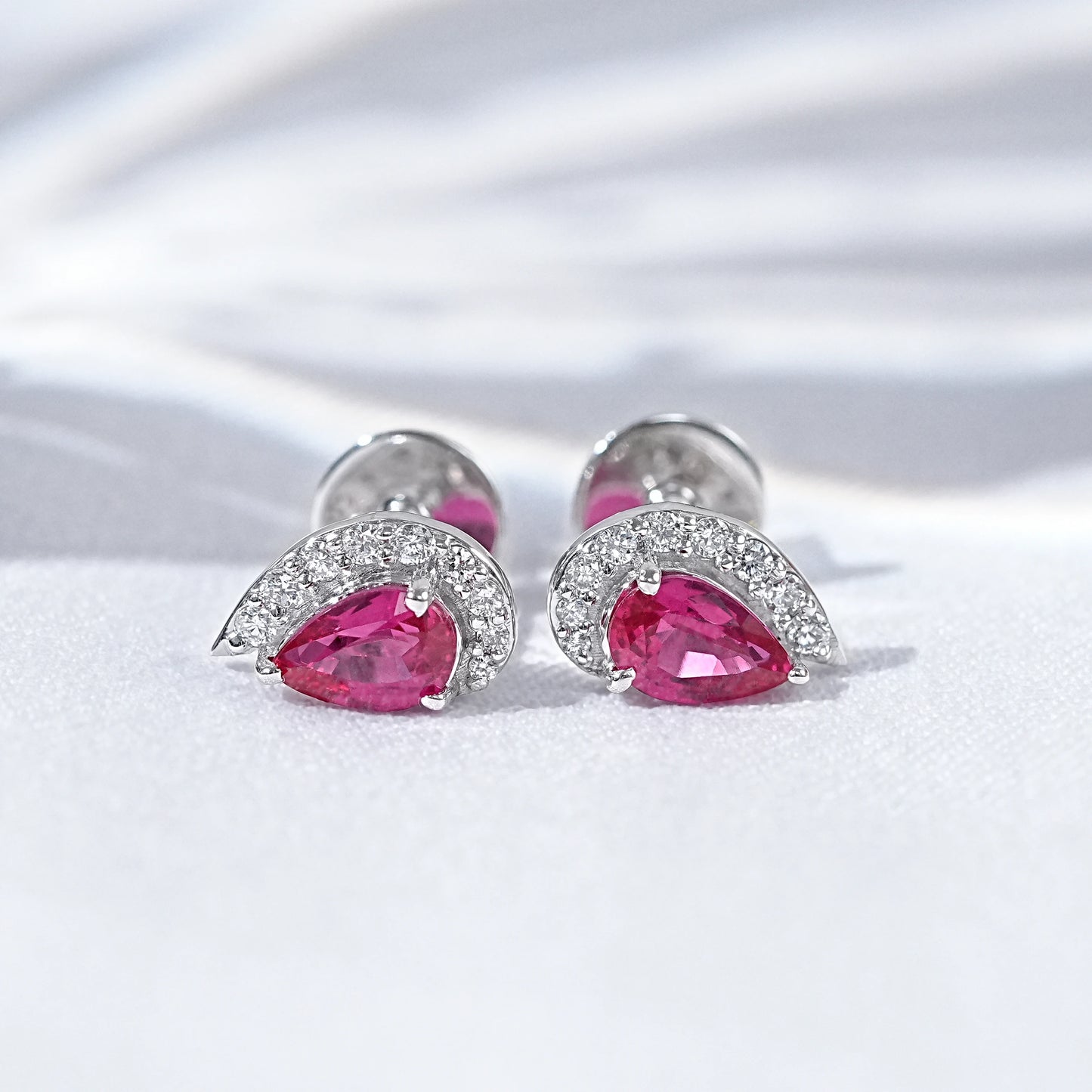Ruby Pear And Half Halo Round Diamond Stud Earrings