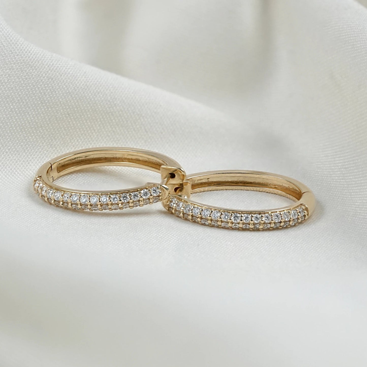 brilliant round-cut natural diamond hoop earrings in yellow gold on fabric