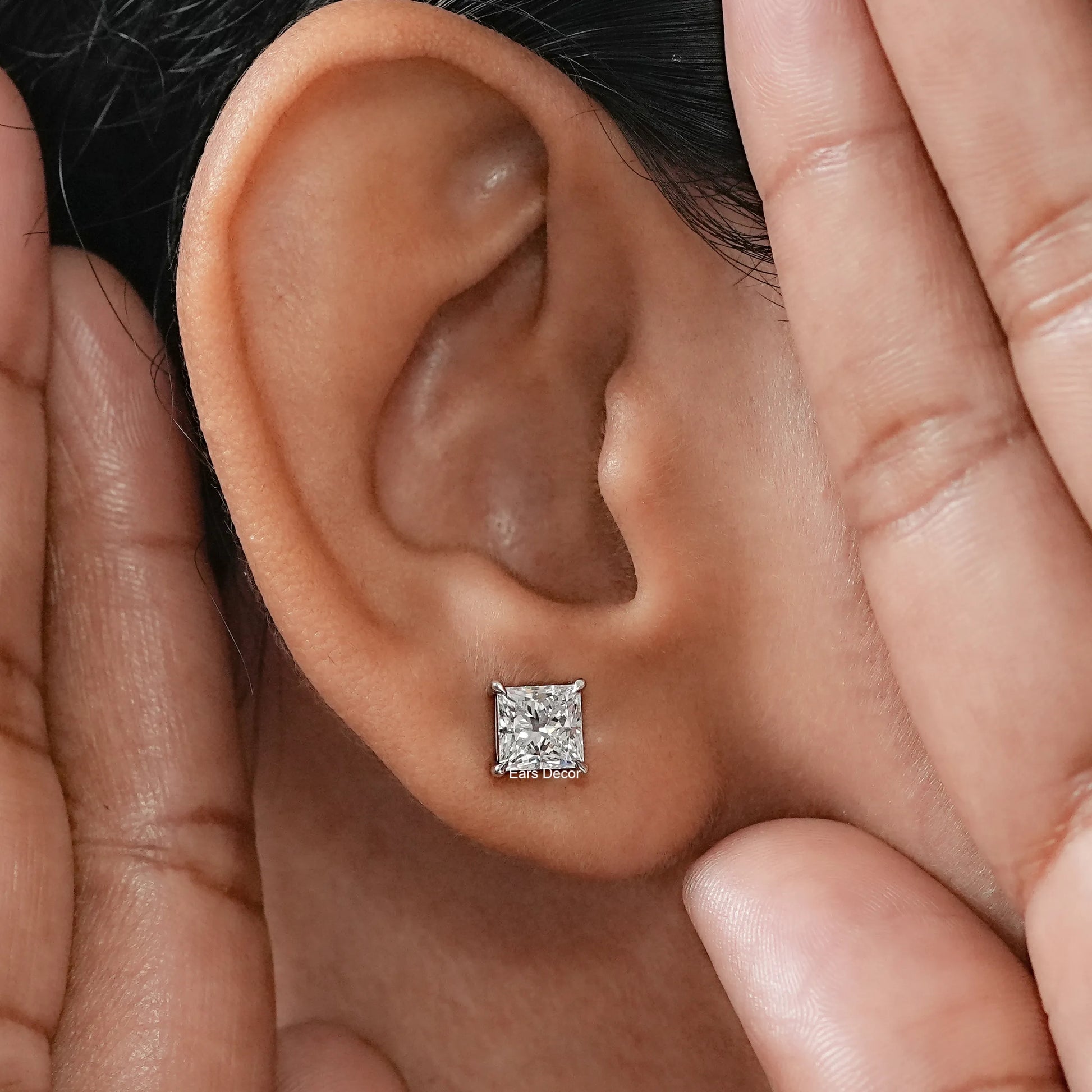 lab grown princess solitaire earrings illustrating a modern and Urbane glow, perfect for adding a touch of London chic to a daily ensemble.