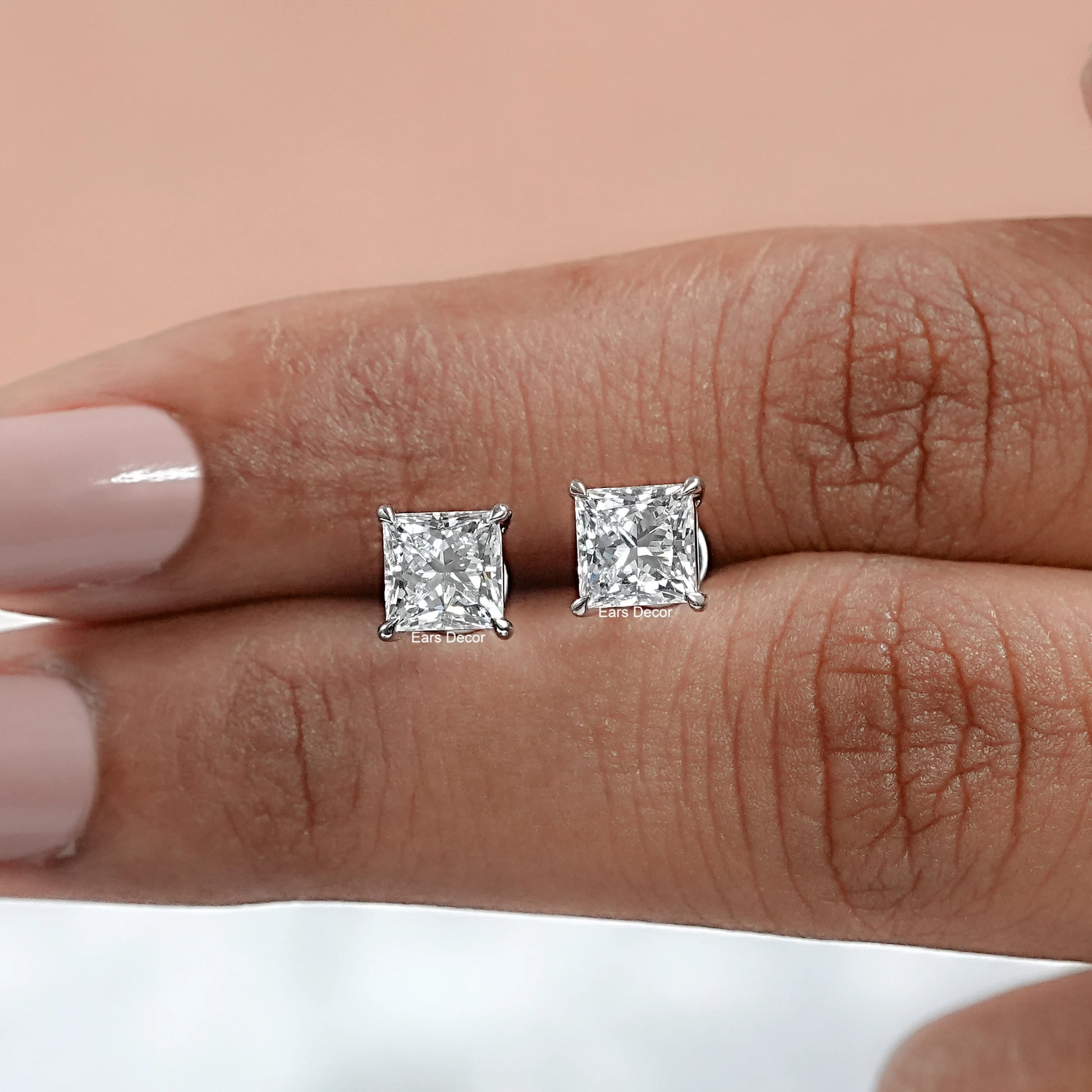 Princess Cut Lab Grown Diamond Solitaire Stud Earrings featuring a bold square stone that offers a smashing and rather distinguished sparkle for any occasion.