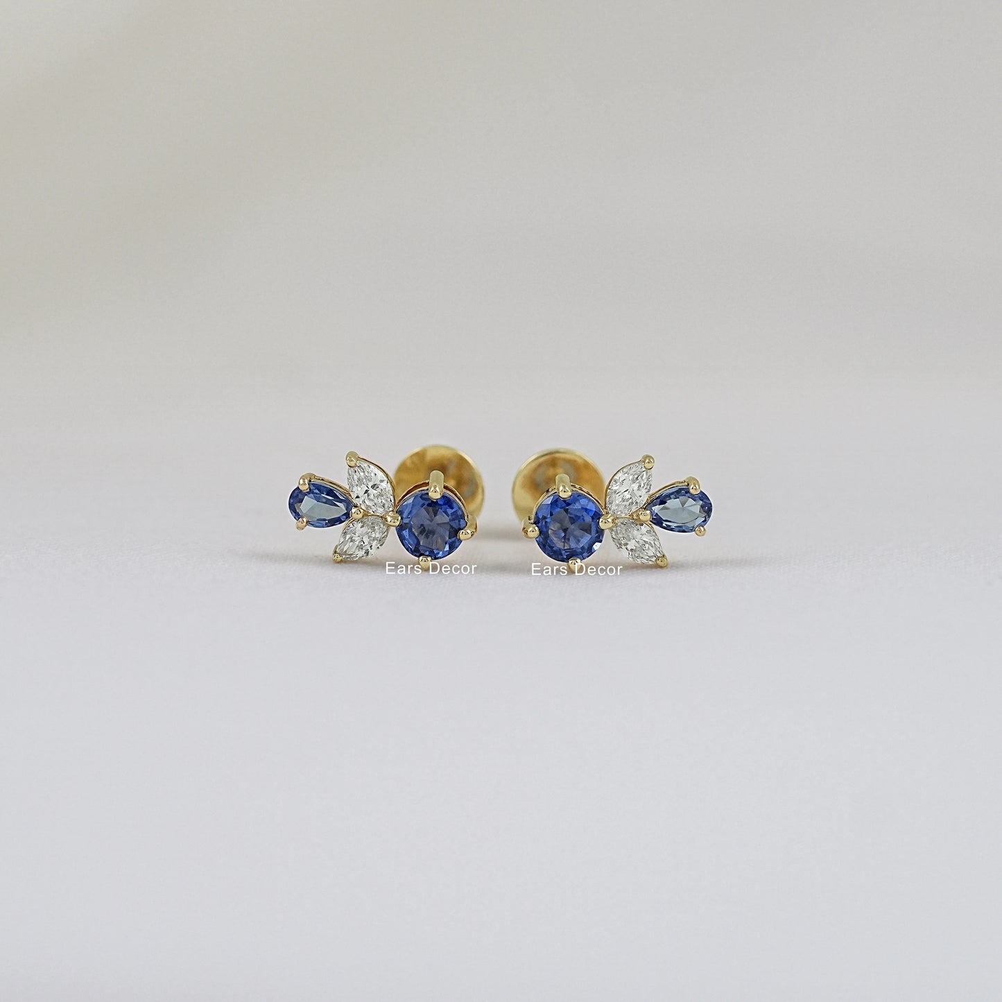 Blue Pear And Round Gemstone Cluster Set Earring