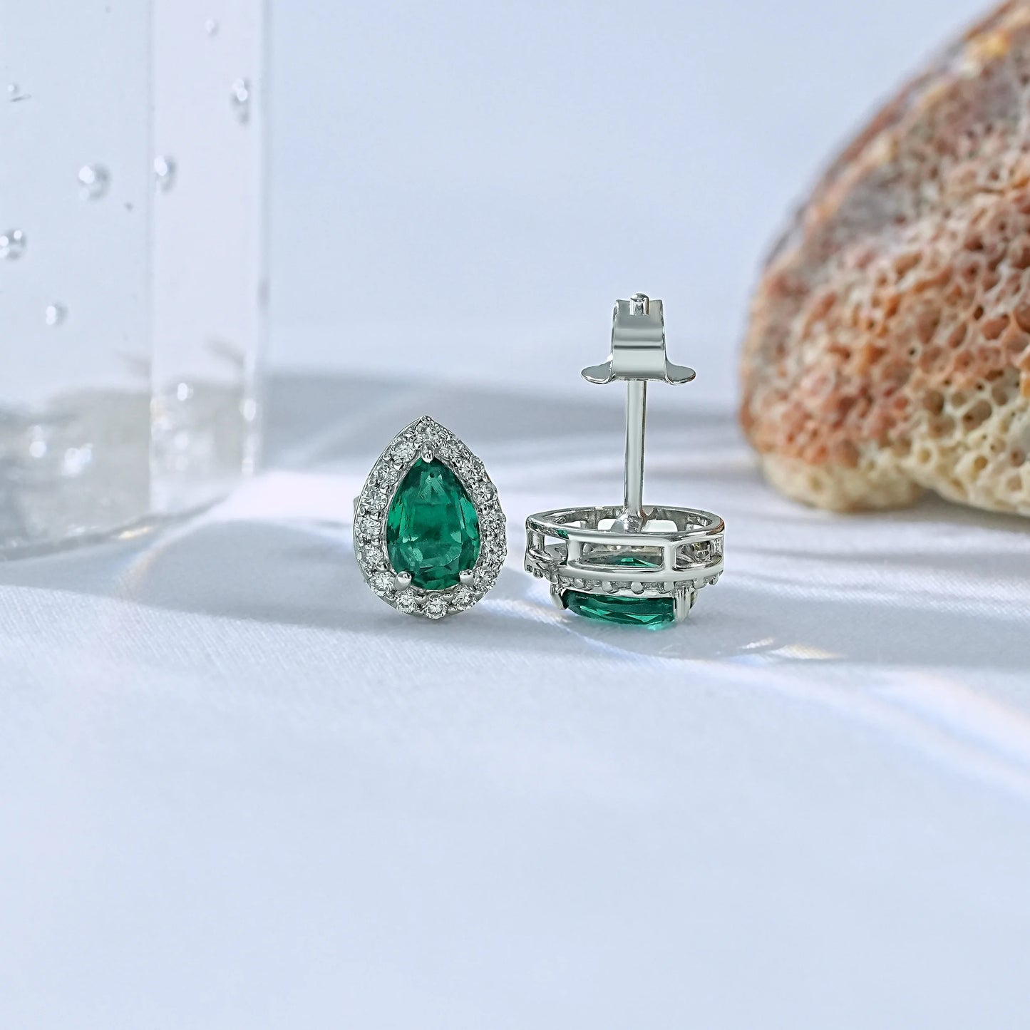 Lab created emerald teardrop stud earrings with diamond halo front back angle view white gold butterfly push back clasp