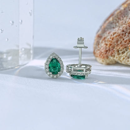 Lab created emerald teardrop stud earrings with diamond halo front back angle view white gold butterfly push back clasp