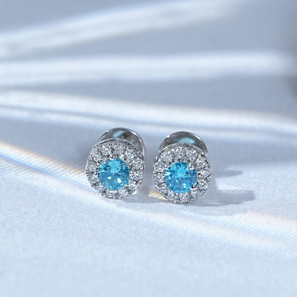 Round Topaz Blue Halo Stud Earrings