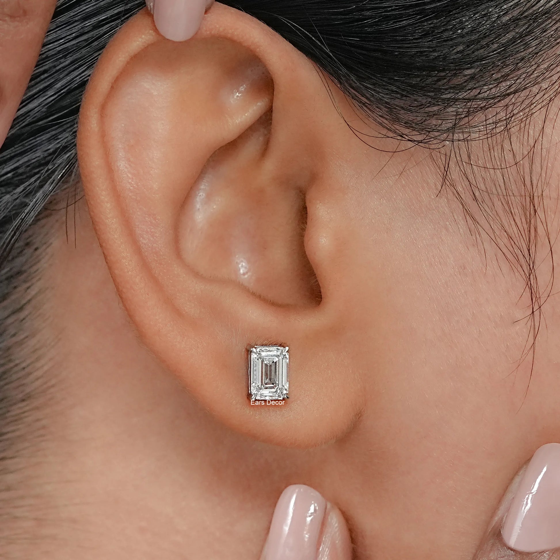 Lab grown emerald diamond stud earrings presenting a sleek elongated silhouette with a clean, refined style suited for effortless everyday elegance.