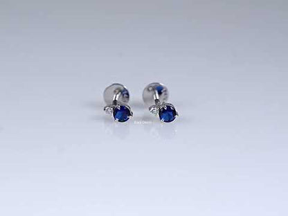 Round Cut Tanzanite And Diamond Two Stone Stud Earrings